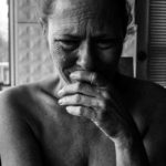 Canva - Close-up Photography of Crying Woman Next Inside Room